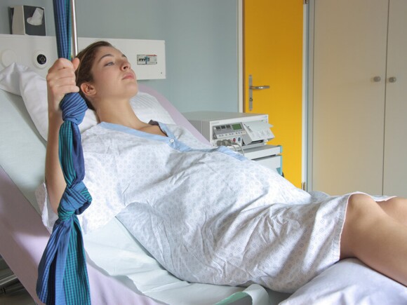 Pregnant women on hospital bed