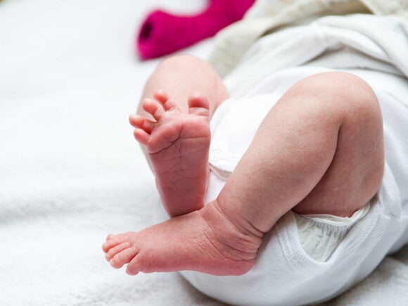 Baby leg and bottom in diaper