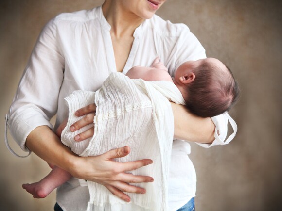 Lady holding a baby