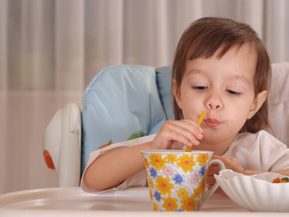 Kid drinking using straw
