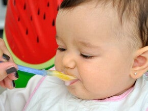 spoon feeding baby spoon feeding baby