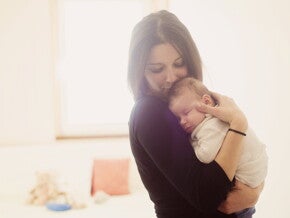 Mother holding baby Mother holding baby