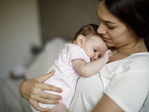 Baby on mothers chest