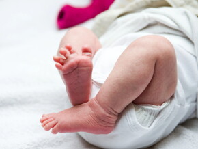 Baby leg and bottom in diaper