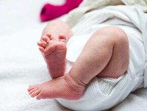 Baby leg and bottom in diaper