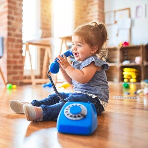 Baby girl with telephone Baby girl with telephone