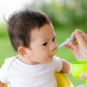 spoon feeding baby spoon feeding baby