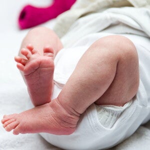 Baby leg and bottom in diaper