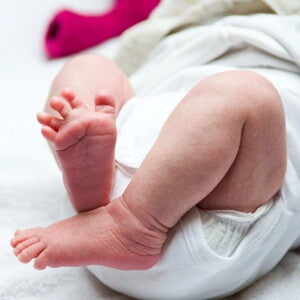 Baby leg and bottom in diaper