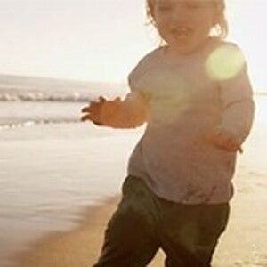 baby on sandy beach near the sea baby on sandy beach near the sea
