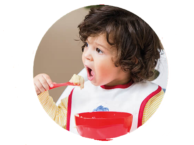 kid eating with spoon kid eating with spoon