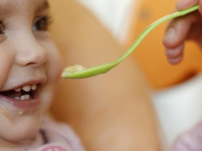 spoon feeding baby spoon feeding baby